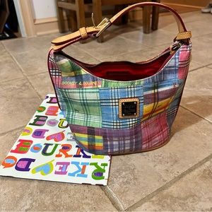 Dooney & Bourke hand bag.  Never used with key chain on purse
